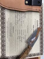 Custom made knife with leather sheath